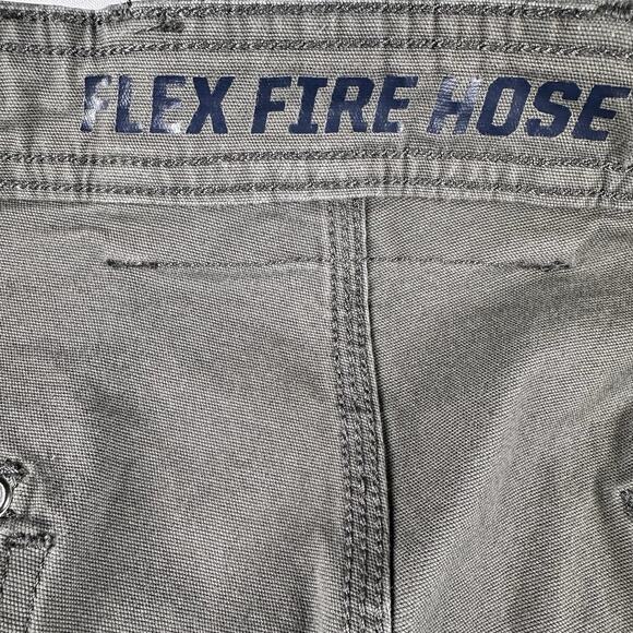 Duluth Men 44 Flex Fire Hose Relaxed Fit Cargo Shorts Khaki Green Stretch - Picture 7 of 13